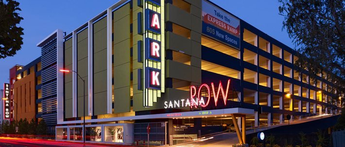 Completed parking structure illuminated at dusk